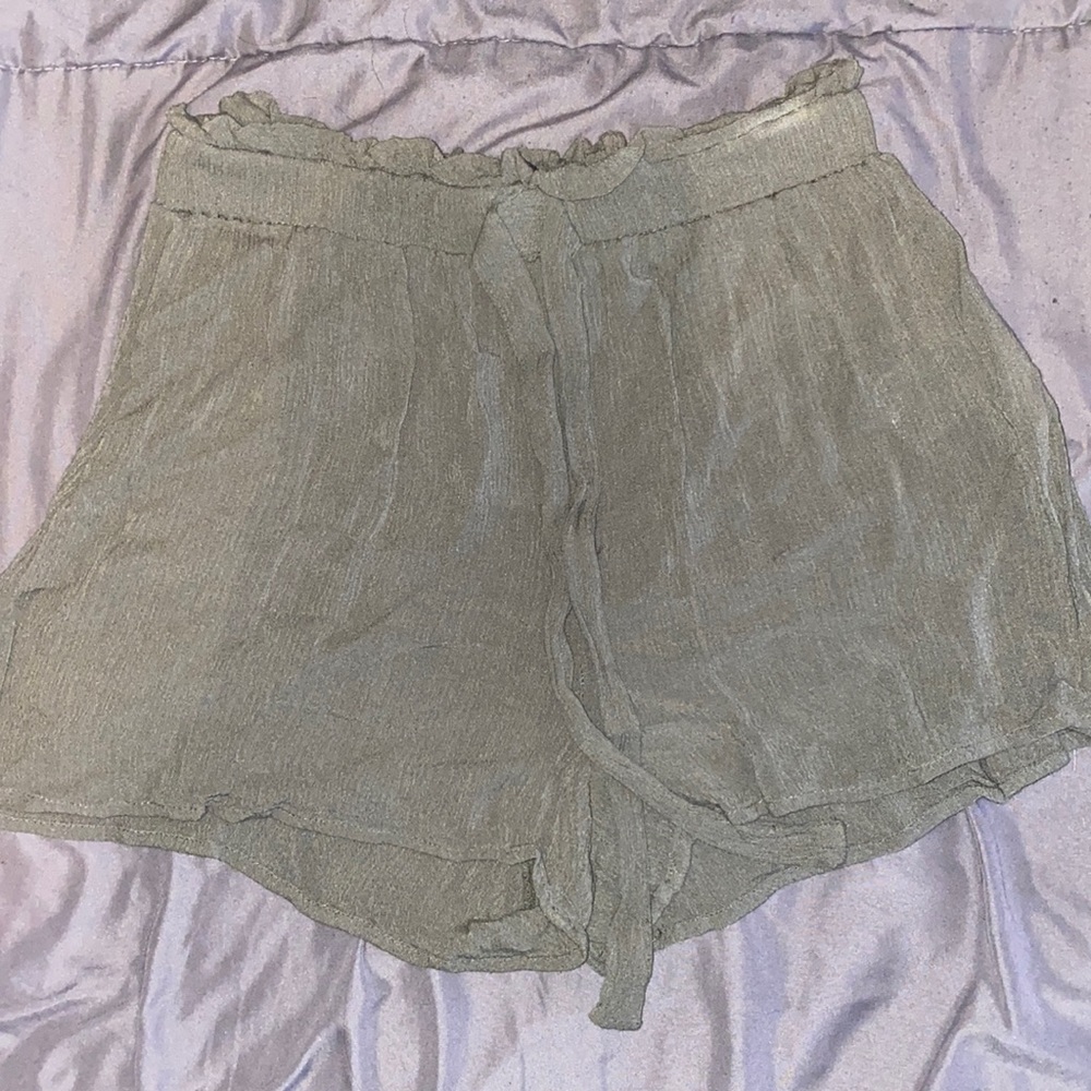green shorts